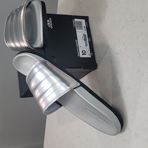 Adidas Adilette Comfort sandals.